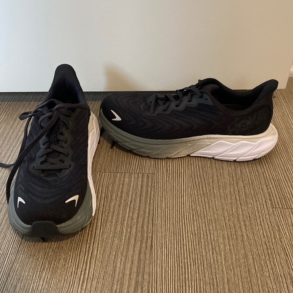 Black and white Hoka shoes